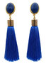 Quaste-in-hellblau-an-Acryl-Oval-blau-marmoriert